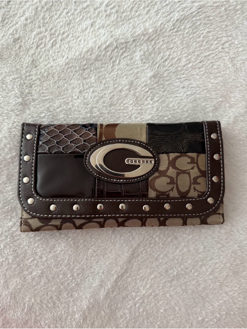 Stylish Patchwork Wallet with Metallic Accents